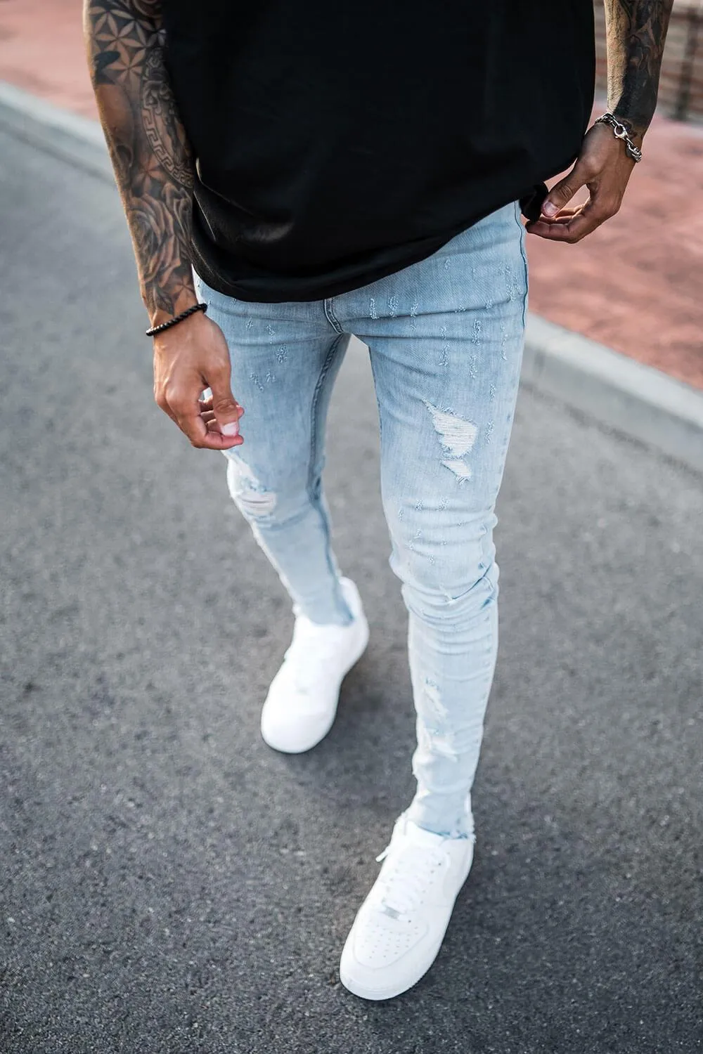 Destroyed Hem Jeans - Light Blue