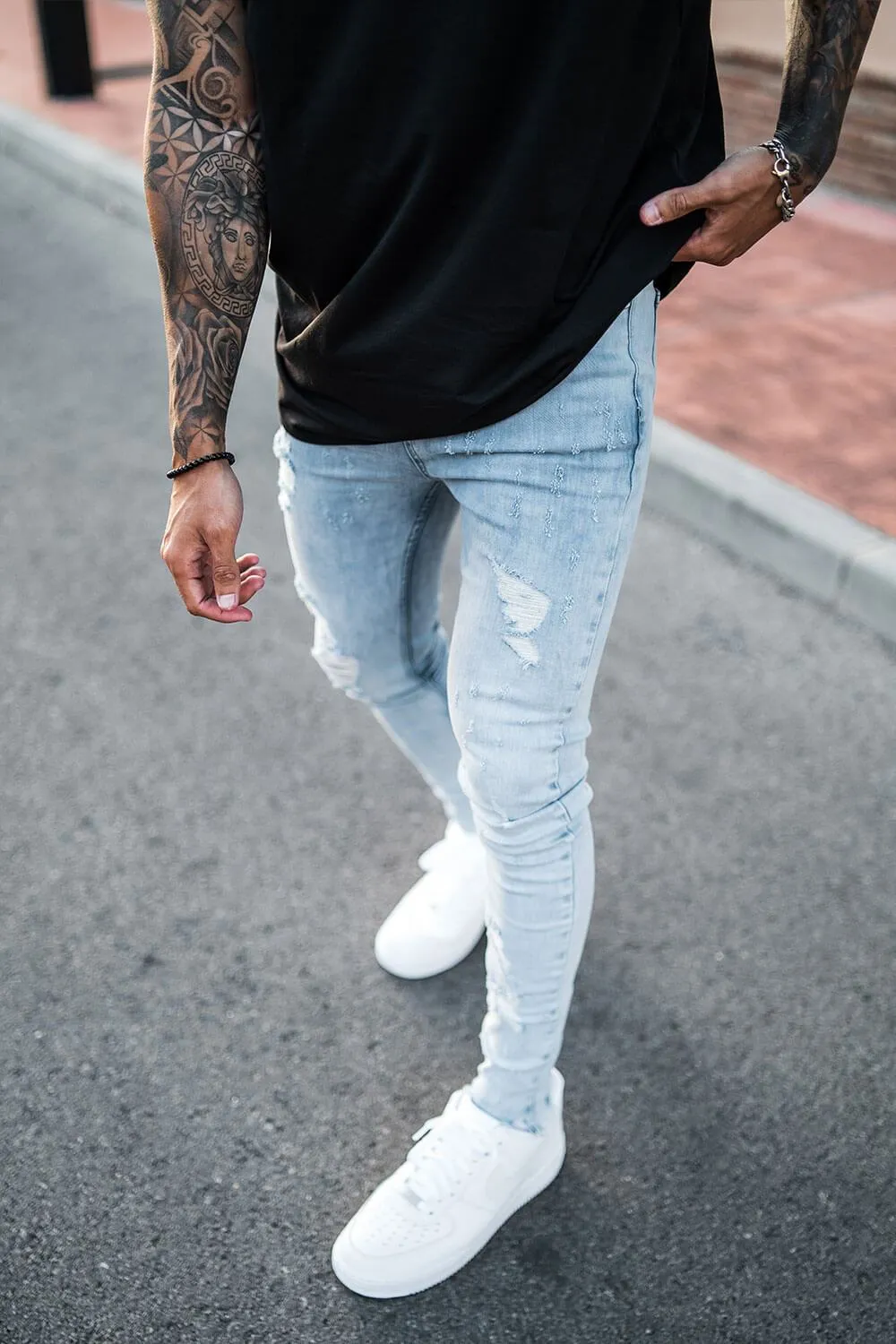 Destroyed Hem Jeans - Light Blue