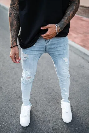 Destroyed Hem Jeans - Light Blue