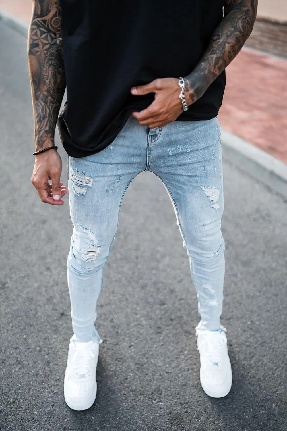 Destroyed Hem Jeans - Light Blue